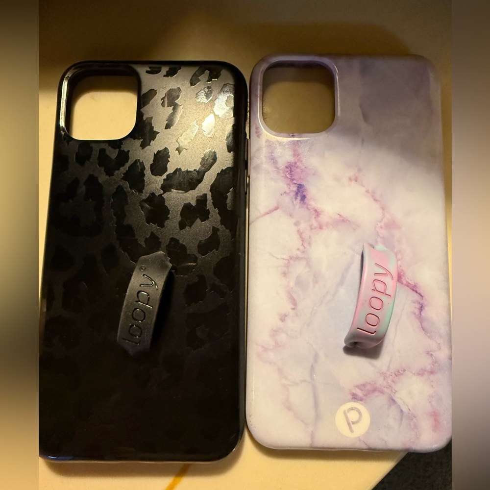 Two used Loopy iPhone 11 Pro Max cases, both Lefty with one case bag.